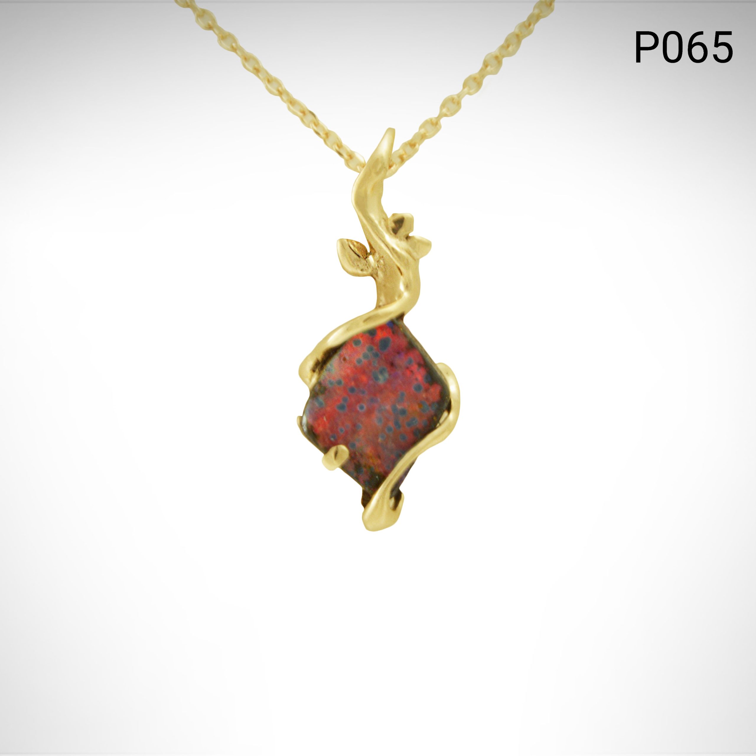 Pendant_red_kit_shape_Boulder_opal_yellow_gold